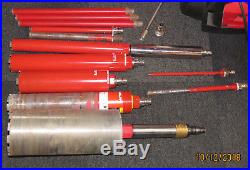 Hilti DD130 Diamond drilling rig plus vacuum pump plus various core drills